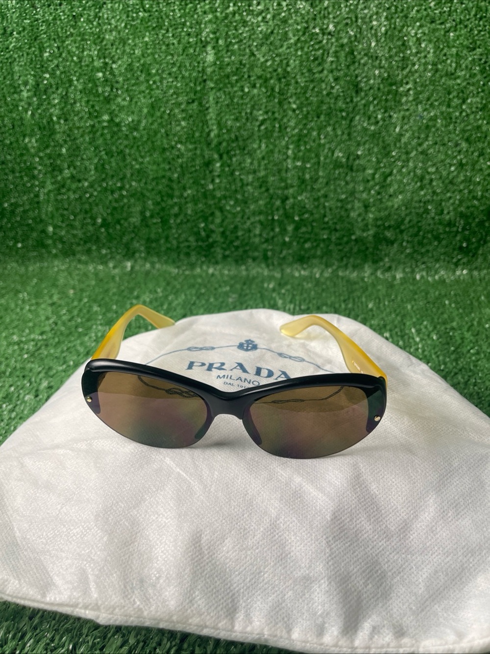 Prada Two-Tone Cat Eye Sunglasses in Black and Yellow - Picture 15 of 15